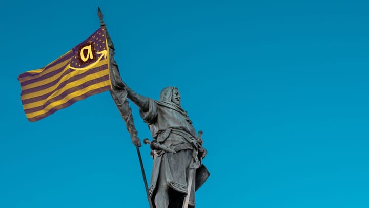 Statue of a medieval knight raising a flag with modern corporate symbols: an 'a' with an arrow symbolizing technocapitalism